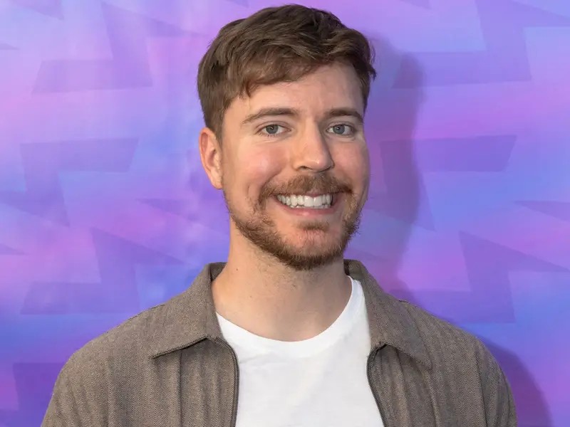 MrBeast, also known as Jimmy Donaldson, smiles for a photo, representing his prominent role as a leading content creator on YouTube.