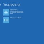 Windows Recovery Environment Troubleshoot Options Screen: Access Advanced Settings for Startup.