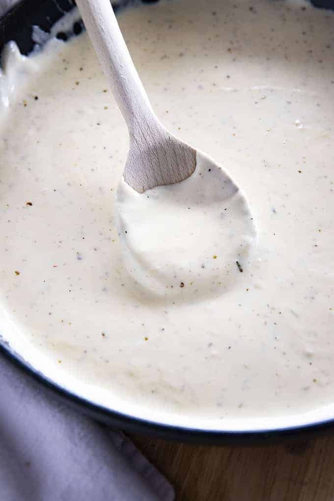 Homemade Alfredo sauce recipe in saucepan