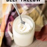 Beef tallow in a glass mason jar with text overlay - How to Make Beef Tallow.