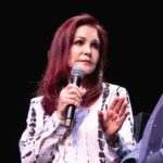 Priscilla Presley welcomes Elvis fans to Graceland for candlelight vigil