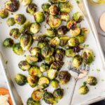 Close-up of vibrant green Brussels sprouts, showcasing their fresh and appealing texture.