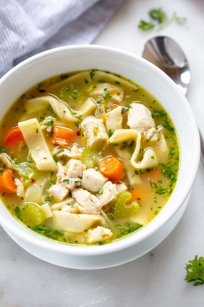 A comforting bowl of homemade chicken noodle soup with rich broth and egg noodles.