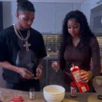 Cooking with Kya, a TikTok food creator, poses with rapper DDG, highlighting her broad appeal and influence in popular culture.