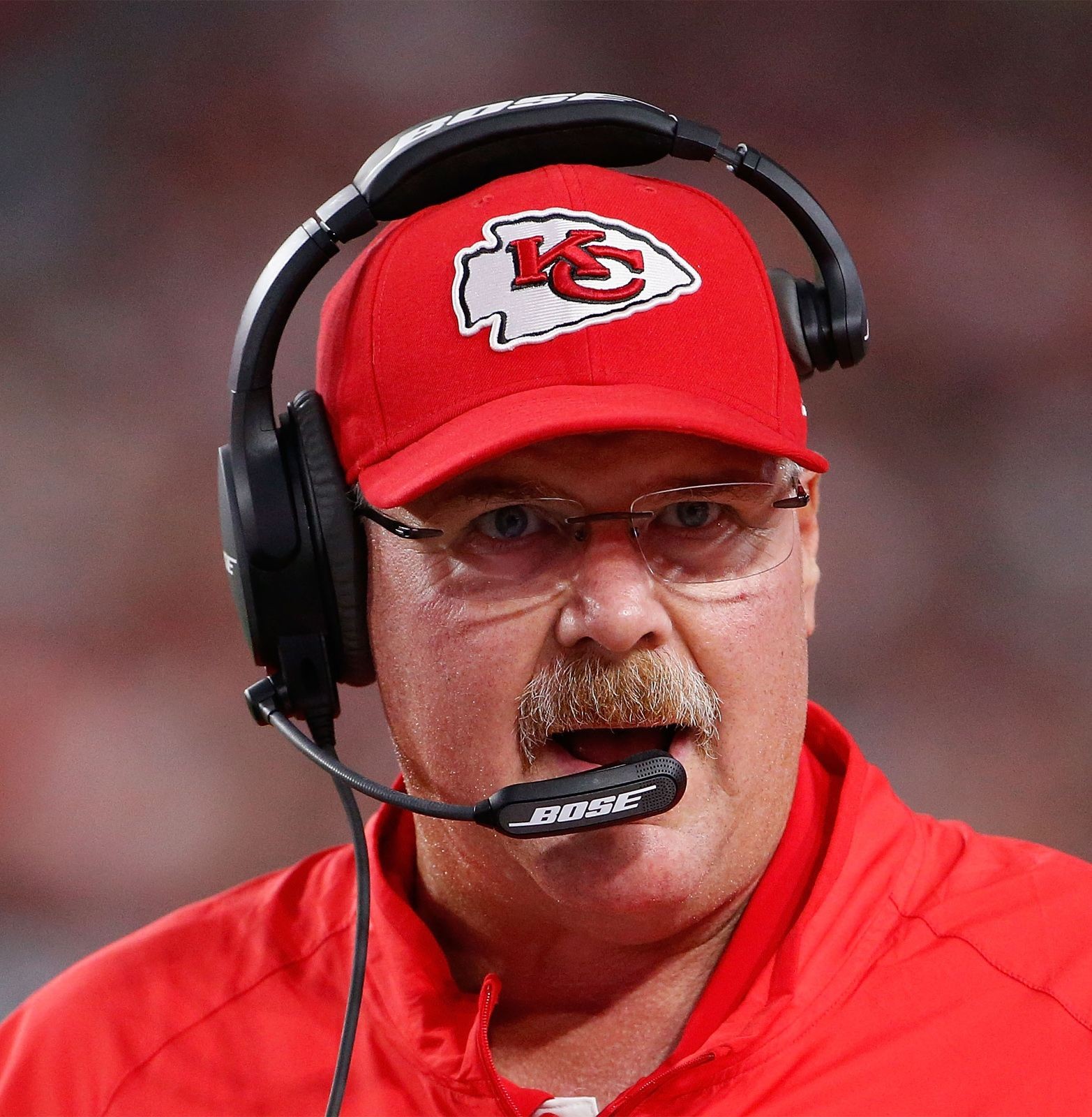 Andy Reid headshot from 2015, showcasing his Kansas City Chiefs coach role.