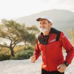 photo of a healthy senior man jogging for fitness