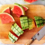 Best way to cut a watermelon - wedges on a cutting board with knife