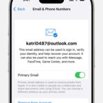 iPhone settings showing steps to change primary email address for Apple Account