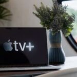 Apple TV Plus logo on a Macbook Pro