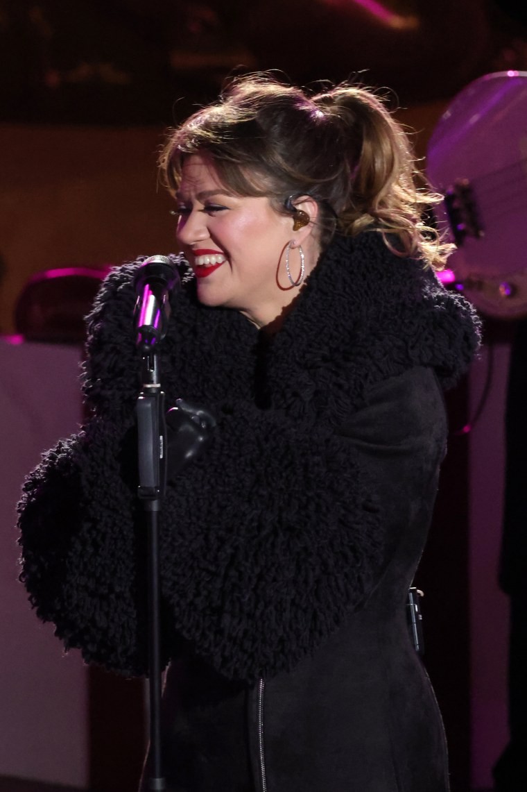 Kelly Clarkson performing at the Rockefeller Center Tree Lighting Ceremony in December 2024, showcasing her public appearances amidst her health journey.