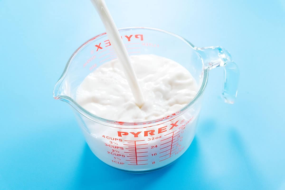 Pyrex quart measuring cup showing liquid measurements, useful for comparing liter and cup volumes