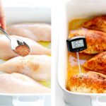 Close-up of seasoning being sprinkled on chicken breasts