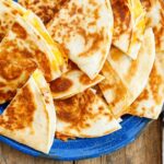 Learn how to make perfectly crisp gooey cheesy quesadillas