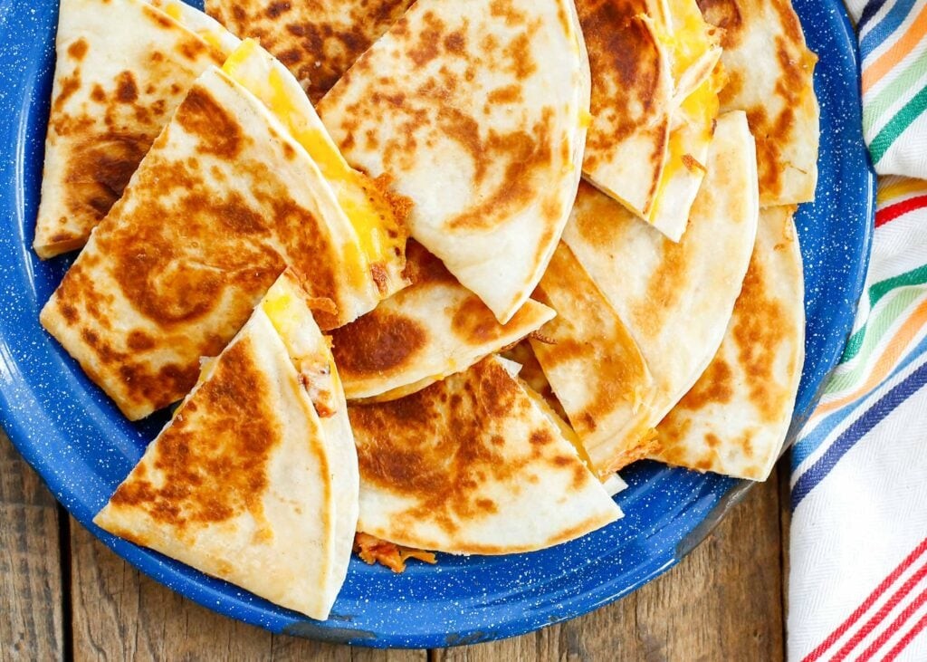 Learn how to make perfectly crisp gooey cheesy quesadillas