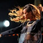 Rihanna performing at the Mandalay Bay Events Center showcasing her stage presence and confident demeanor