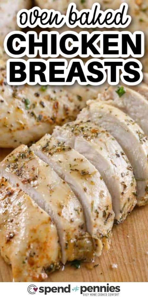 Close-up of juicy oven-baked chicken breasts seasoned with herbs and spices.