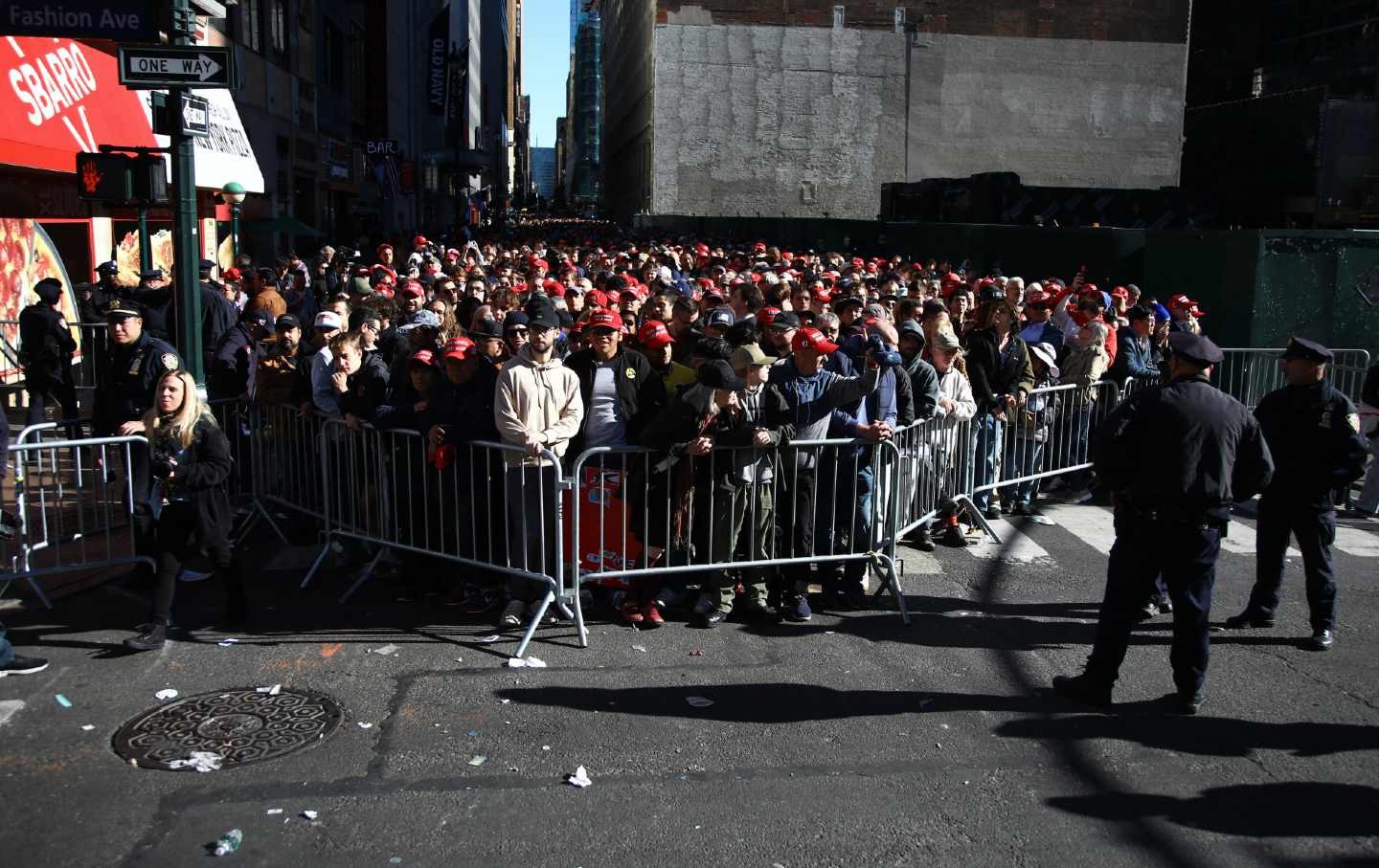 Supporters of former US president and Republican presidential candidate Donald Trump arrive for a campaign rally at Madison Square Garden in New York on October 27, 2024.