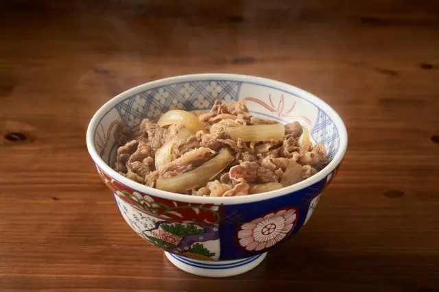 A classic Gyudon (beef bowl), a staple in Japanese fast food, offering a quick and affordable meal.
