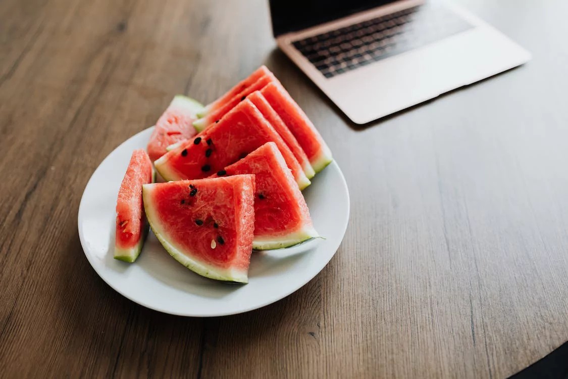 Close-up of refreshing watermelon slices highlighting the juicy texture and vibrant color