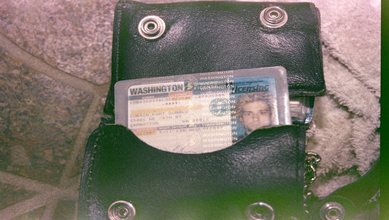 Kurt Cobain's wallet shows how police had removed his Washington State drivers license for identification.