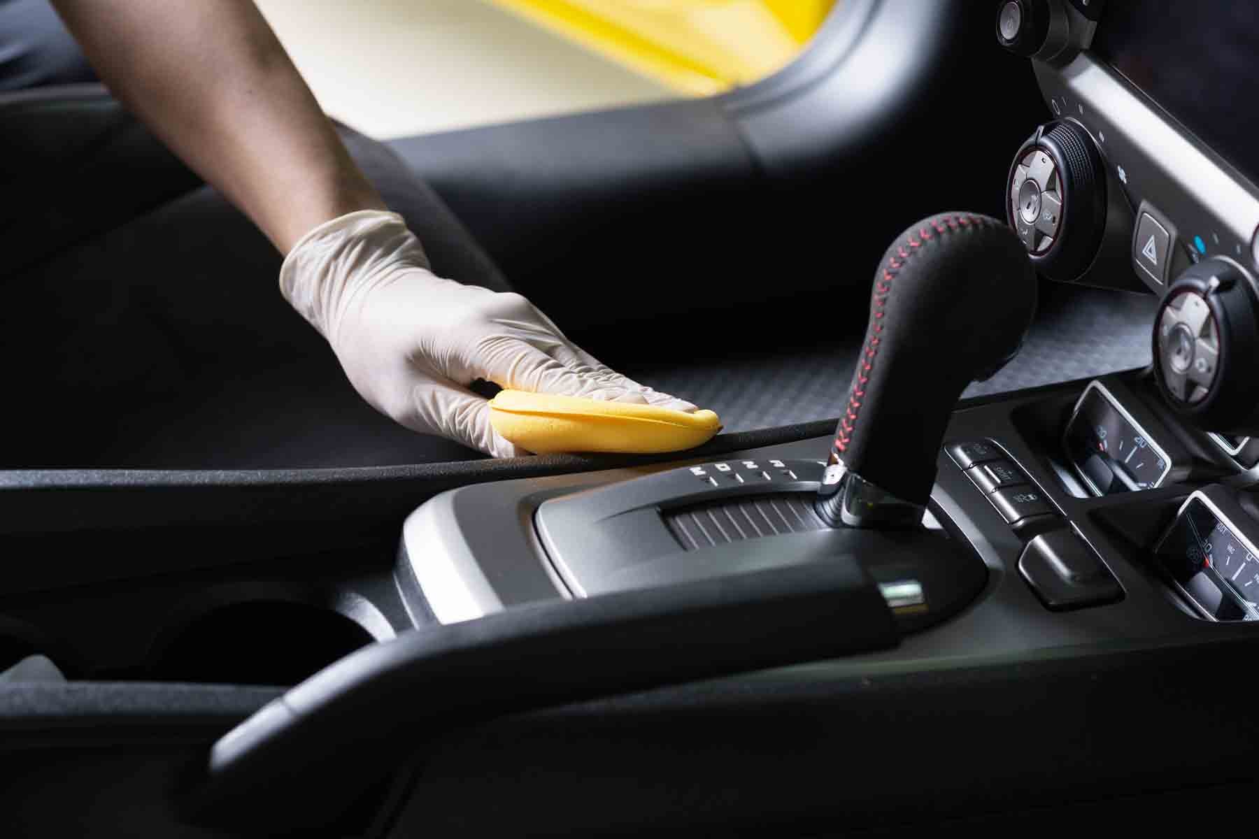 Car Detailing Specialist Cleaning a Car Interior