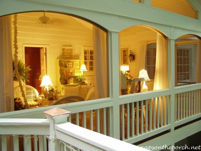 Screened-in porch lit up at night