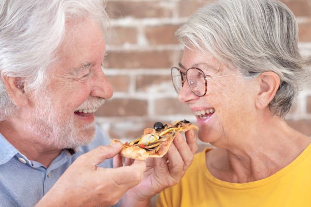 Seniors enjoying Cicis pizza buffet with discount