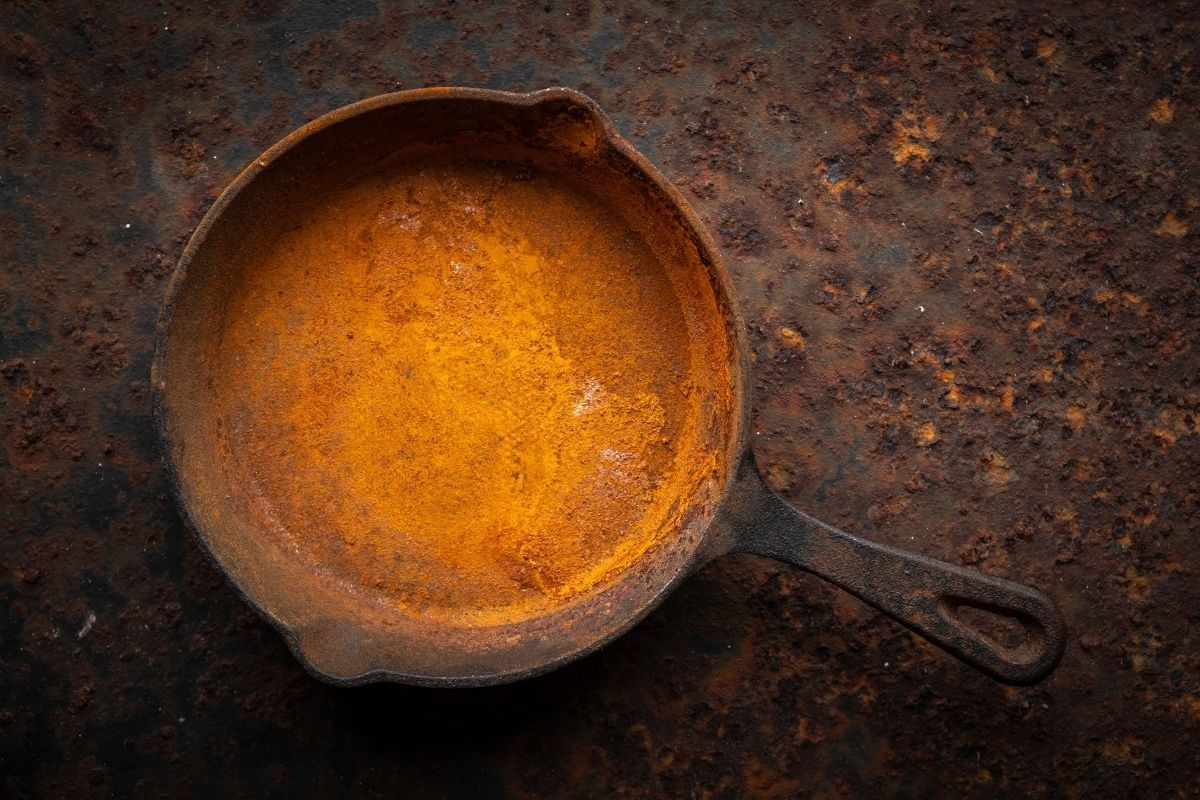 Cast Iron Skillet with bright orange rust
