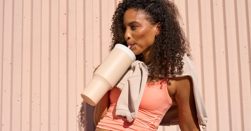 Girl holding an Owala water bottle