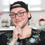 A hairdresser giving a client highlights