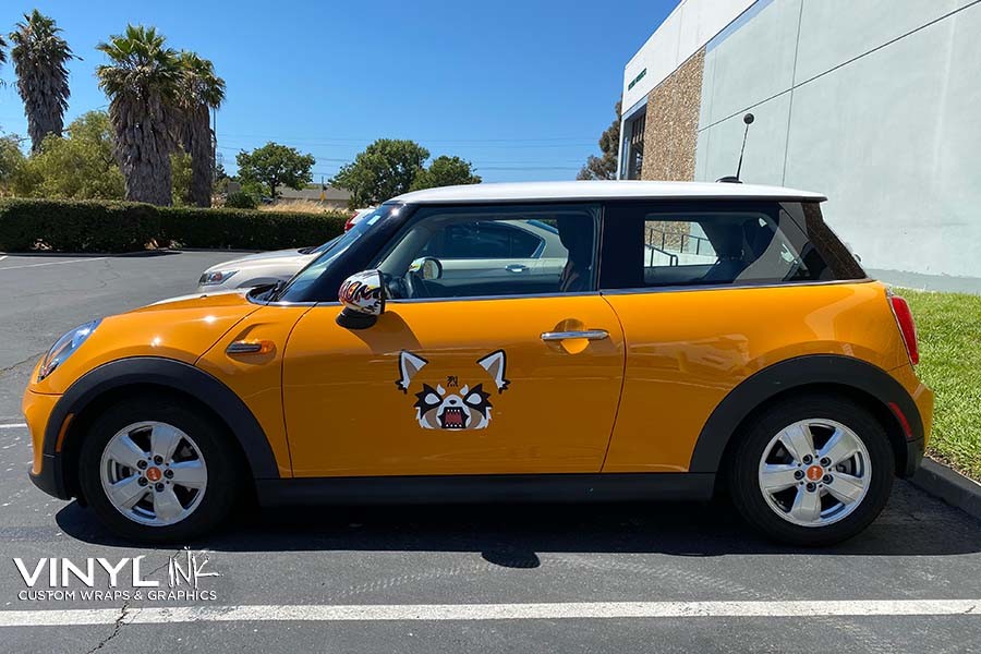 Mini Cooper with partial wrap decal showcasing customized accents
