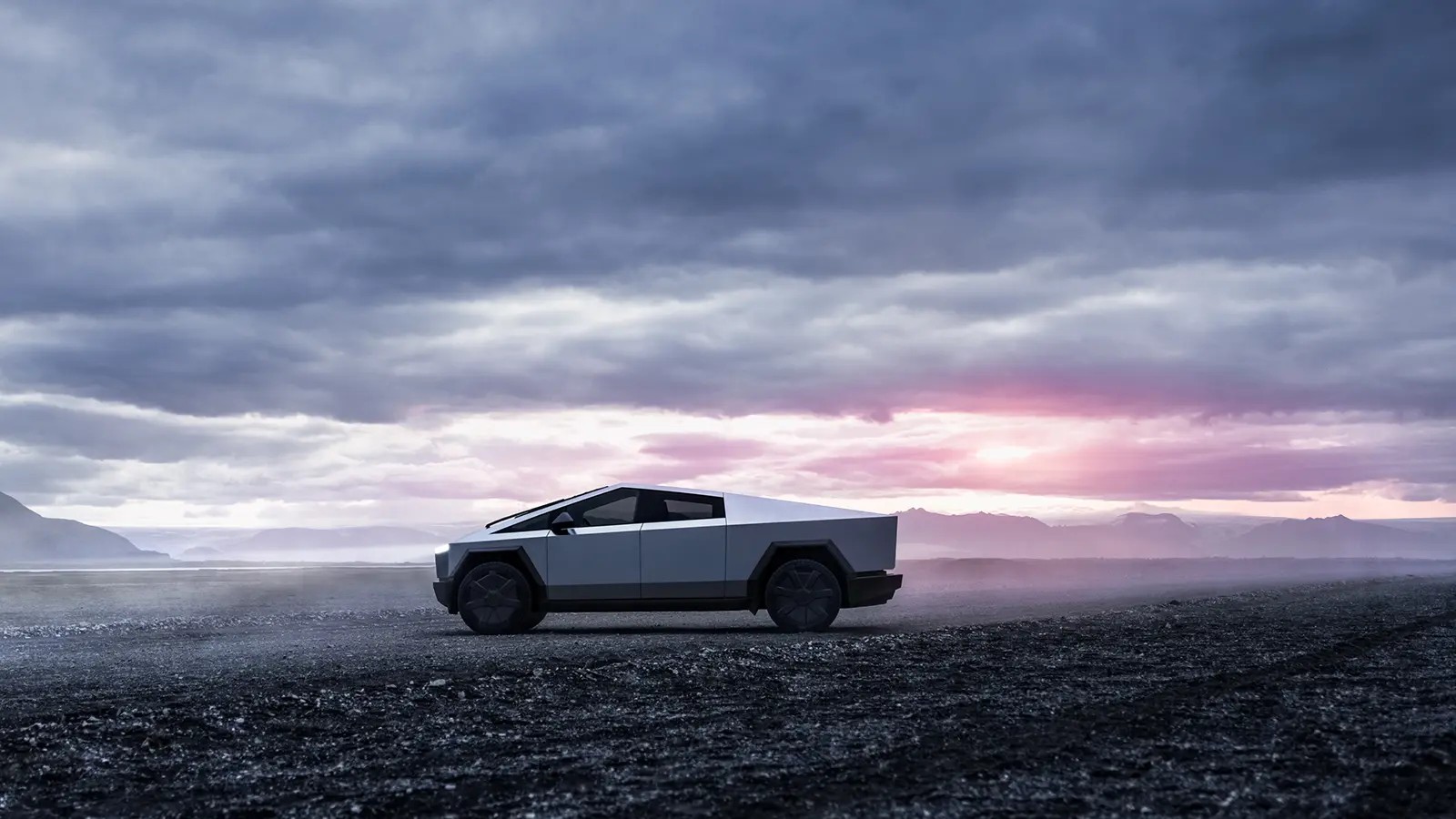 A Tesla Cybertruck parked outdoors, highlighting its futuristic appearance and ride height