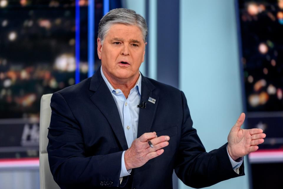 Sean Hannity at a media event, showcasing his influential presence in conservative media.
