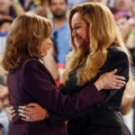 Singer Beyonce and Democratic presidential nominee U.S. Vice President Kamala Harris embrace as they attend a campaign rally of Harris, in Houston, Texas, U.S., October 25, 2024. REUTERS/Marco Bello