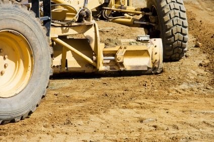 Grading cost depends on amount of dirt to be moved, tractor and operator rates apply