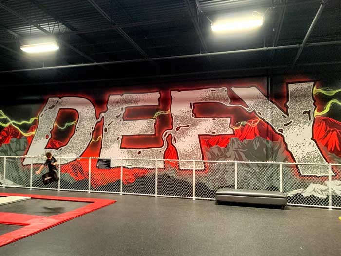 Boy doing a trick on a trampoline in DEFY