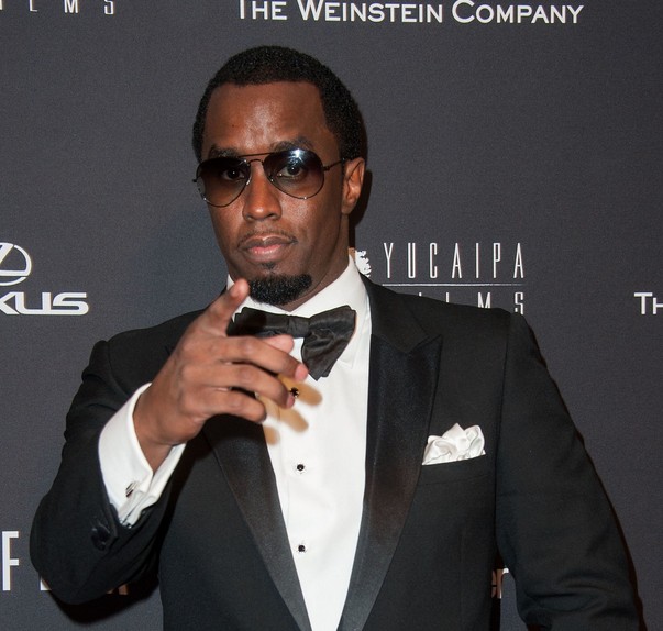 A young Sean Combs, also known as P Diddy, during his early years at Uptown Records, showcasing his ambition and dedication