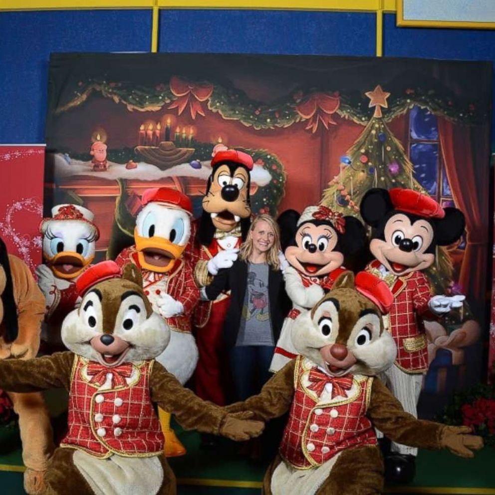 Characters greet guests at Disney World