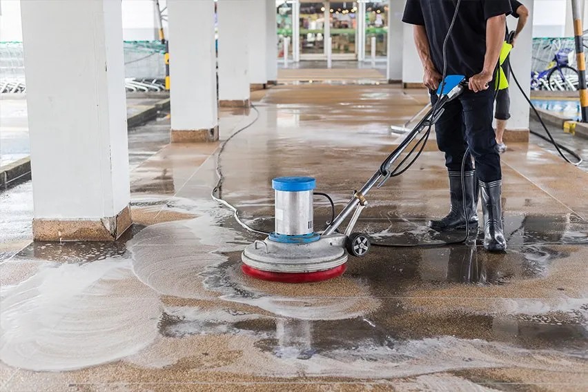 Power washing a wooden deck