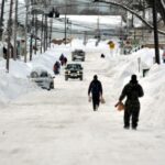 View of Buffalo, New York in winter, showcasing heavy snowfall and its impact on the city's landscape
