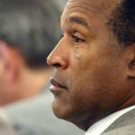O.J. Simpson listens during his trial