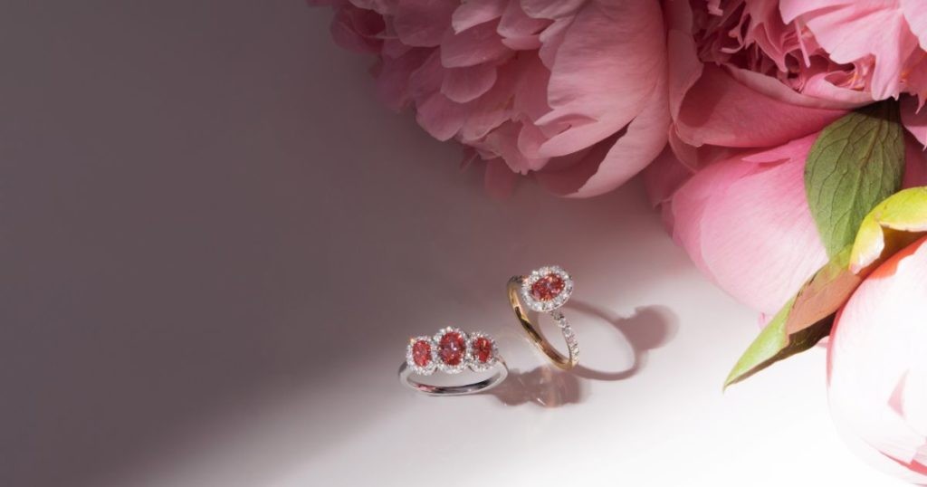 Close-up of a couple exchanging wedding rings, symbolizing love and commitment
