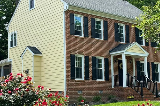 Vinyl siding installation showcasing a modern home exterior