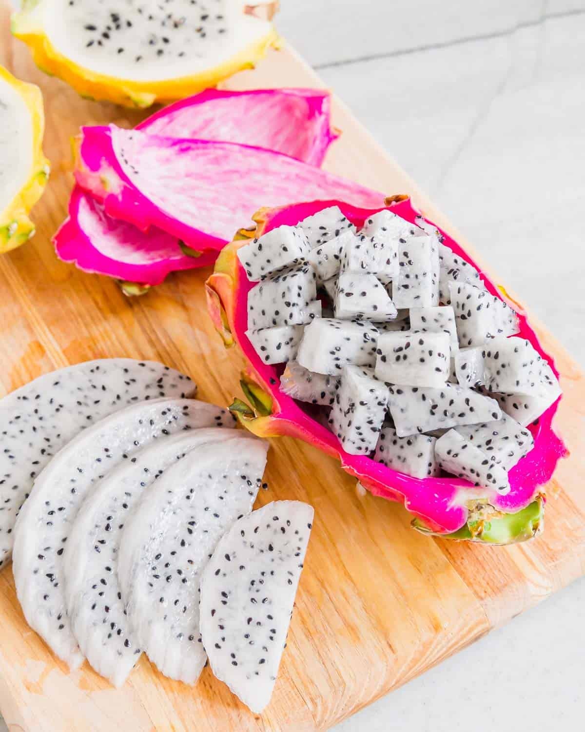 Dragon fruit cut into slices and cubes