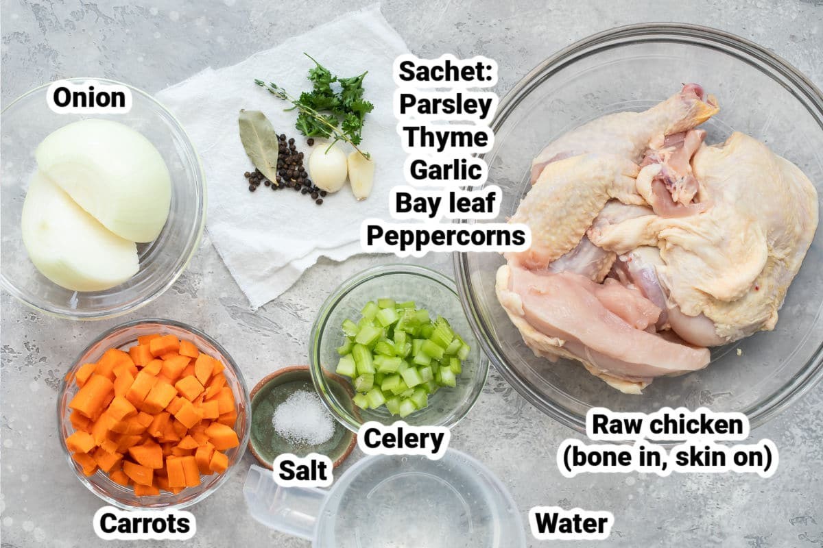 Assortment of fresh vegetables including carrots, celery, and onions.