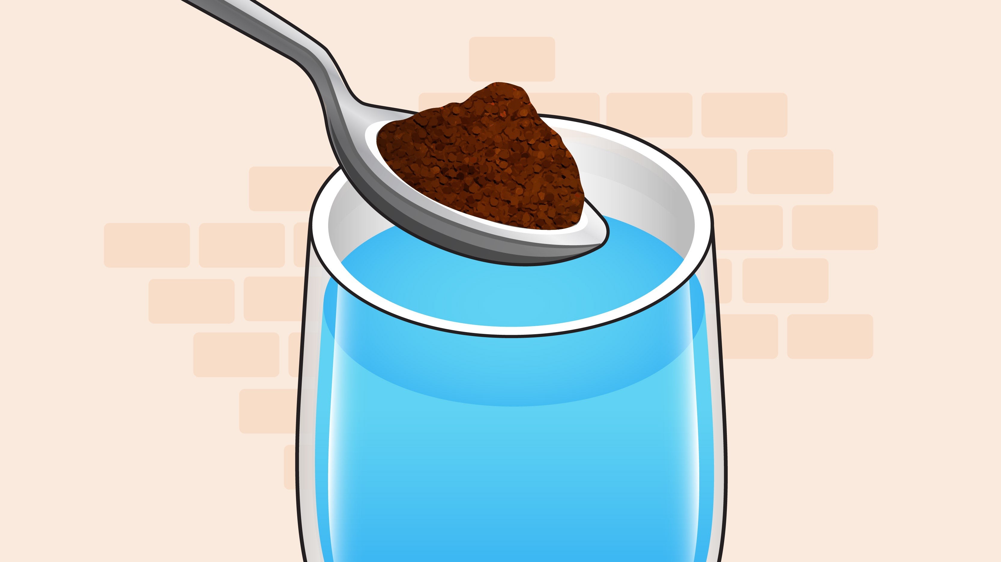 Spoon adding instant coffee powder to a glass of water