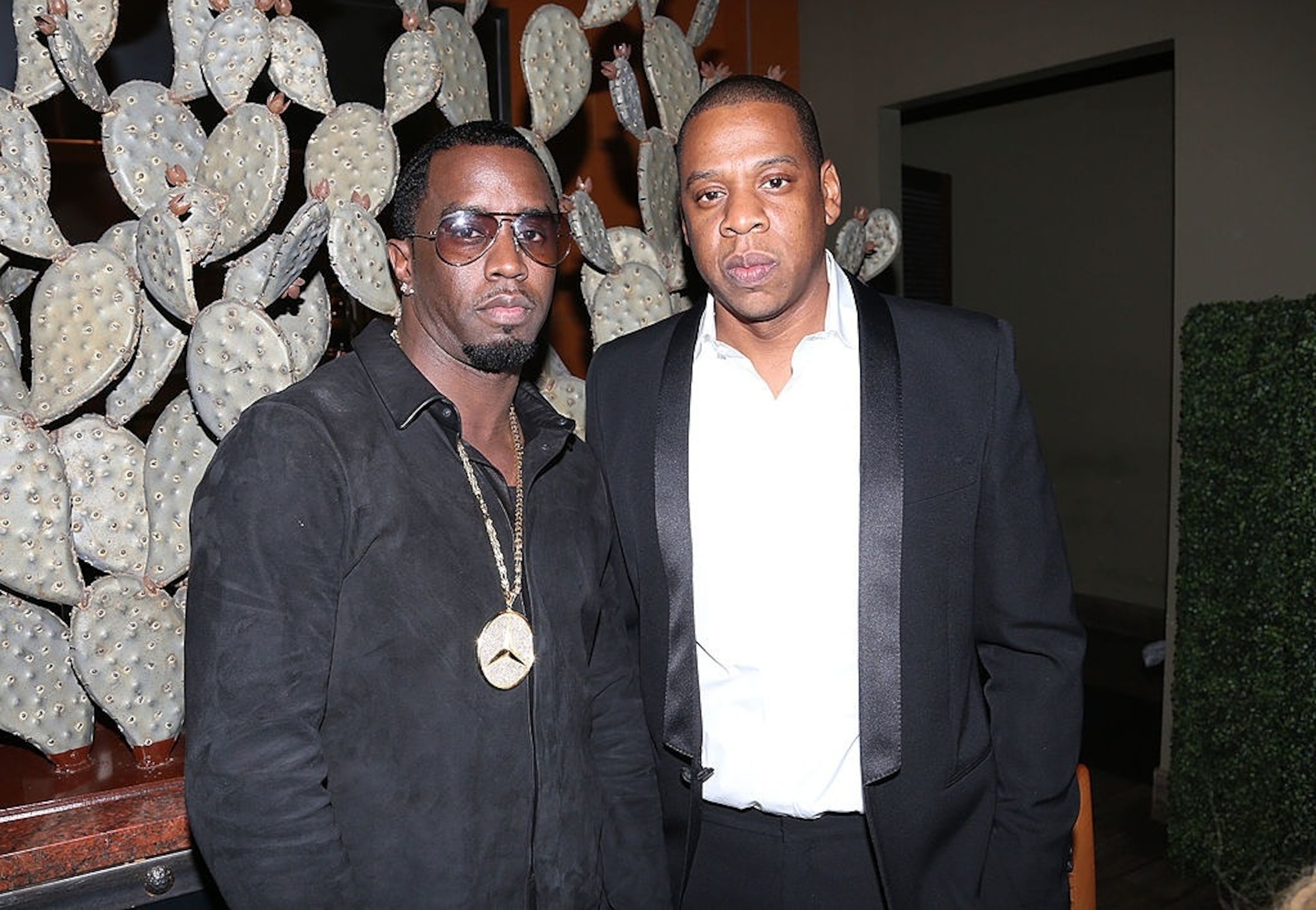 Jay-Z with his debut album cover