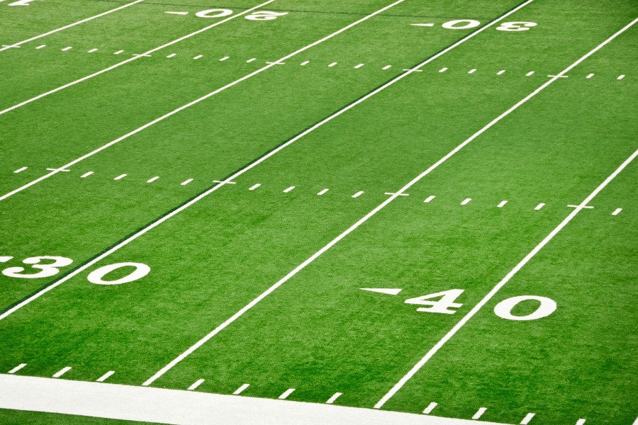 A football field showing the yard lines and goalposts