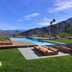 A swimming pool with a breath taking mountain view