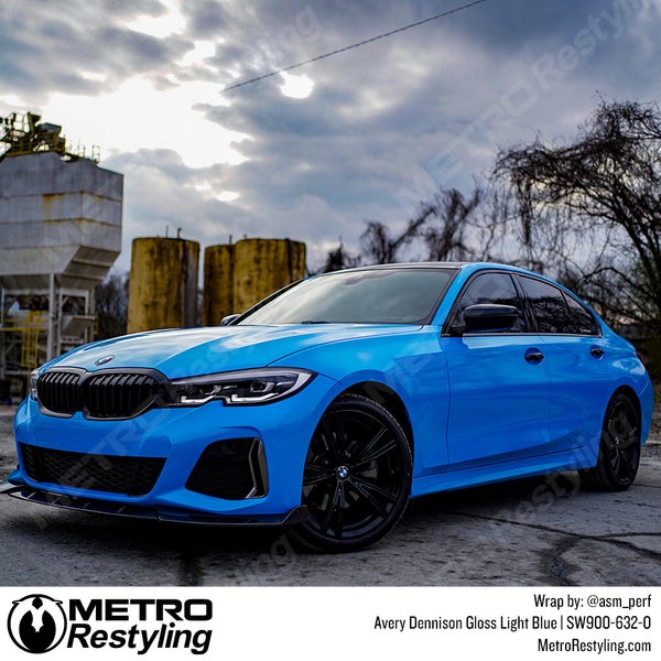 Sedan Wrapped in Avery Gloss Light Blue Vinyl Wrap